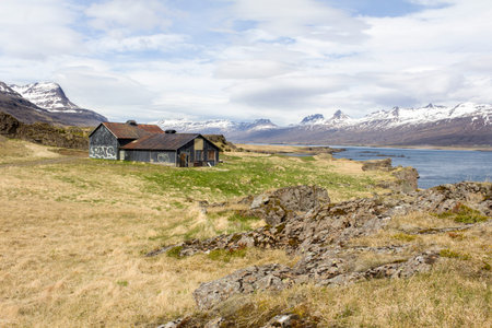 Old abandoned house within Icelandic landscapeの写真素材