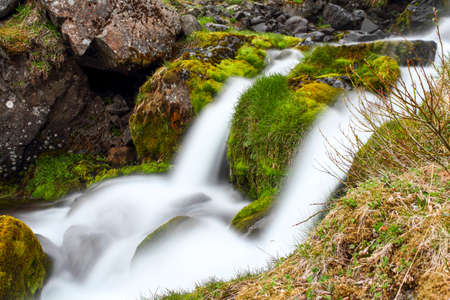 Small waterfall at Seydisfjordur townの写真素材