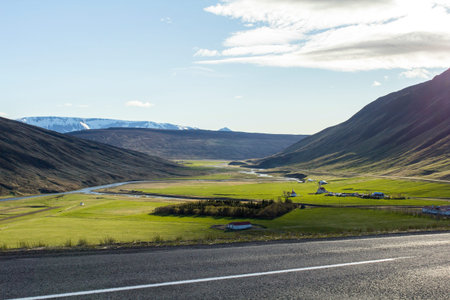 Little village in a wide green valley, Iceland