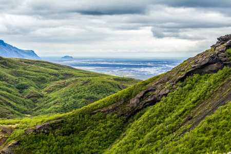 View into the valley of Thorsmoerk, Fimmvorduhals hiking trail in Icelandの写真素材
