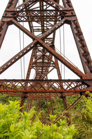 Old unused iron train bridge at the Old Coach Road, North Island of New Zealandの写真素材