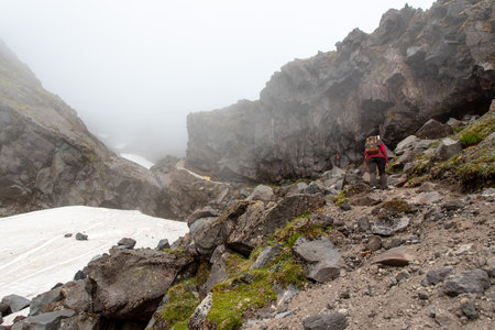 Hiking the Mount Taranaki on a sunny summer day, New Zealandの写真素材