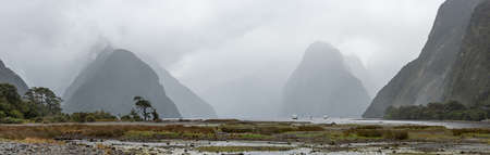 Magnificent panoramic view of Milford Sound during rainy weather, South Island of New Zealandの写真素材