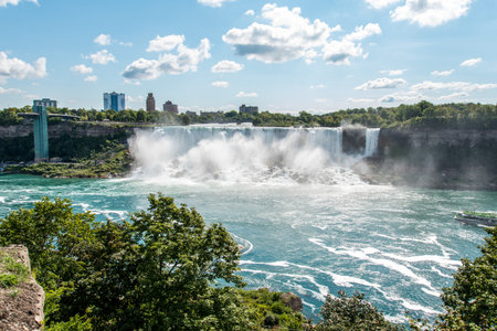 Famous Niagara Falls on a sunny day from the Canadian sideの写真素材