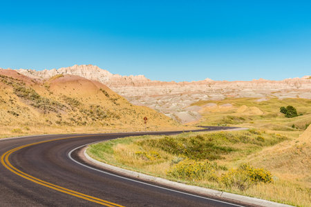 Fascinating colorful hills along the road leading through Badlands National Park, USAの写真素材