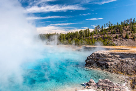 Bright azure colored hot pool in Yellowstone National Park, USAの写真素材