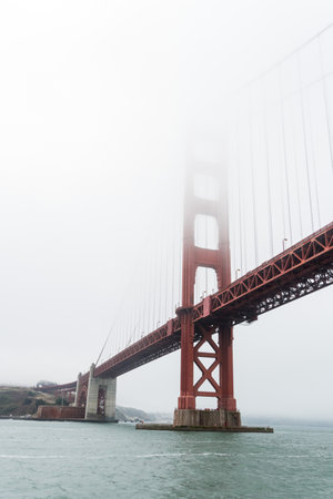 Famous Golden Gate bridge in San Francisco on a foggy day, USAの写真素材