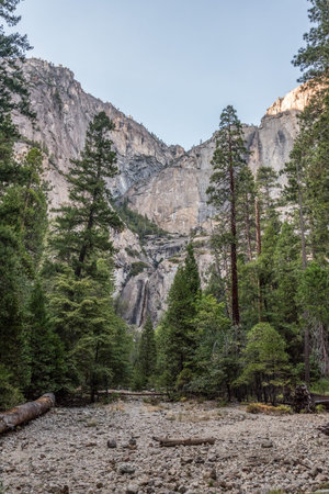 Dry riverbed and empty waterfall spot in Yosemite during the late summer months, USAの写真素材