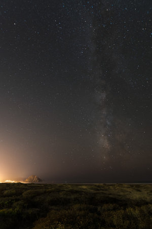 Starry night and the Milky Way above the Big Sur, US West Coastの写真素材