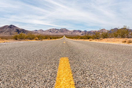 Highway in the scenic landscape of the Desert Valley, USAの写真素材