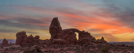 Sunset over Turret Arch in Arches National Park, USAの写真素材