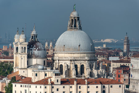 View of the Dome of Church Santa Maria della Salute in Venice, view from Church San Giorgio Maggiore, Italyの写真素材