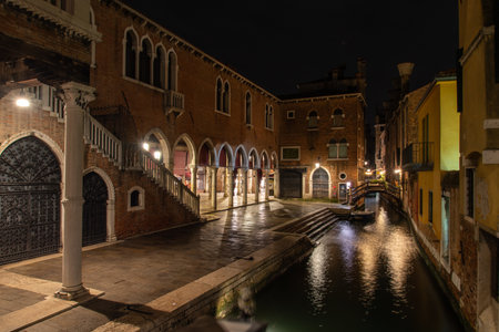 A Canal somewhere in San Polo District in Venice at Night, Italyの写真素材