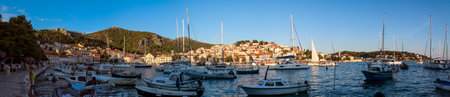 Sunset at the harbor of Hvar, Croatiaの写真素材