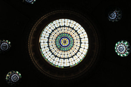 Scenic colorful glass cupola at the ceiling of famous Gellert Spa in Budapest, Hungary
