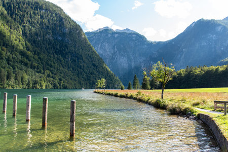Bollards at the Pier Saint Bartholomew at the upper Lake Koenigssee in Bavaria, Germanyの写真素材