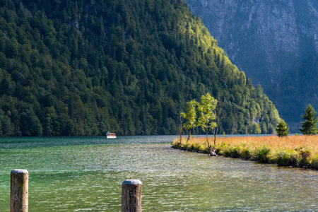 Bollards at the Pier Saint Bartholomew at the upper Lake Koenigssee in Bavaria, Germanyの写真素材