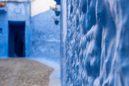 Vibrant blue colored alley in downtown Chefchaouen, Moroccoの写真素材
