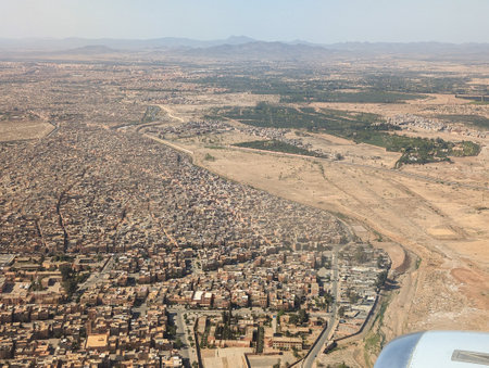 Aerial view of the Moroccan landscape and Marrakesh seen from an airplaneの写真素材