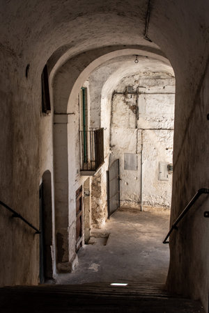 Enchanted empty alleyway in Monte Sant Angelo, Gargano peninsula in Italyの写真素材