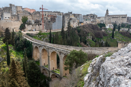 The famous aqueduct bridge from Roman times in Gravina, Southern Italyの写真素材