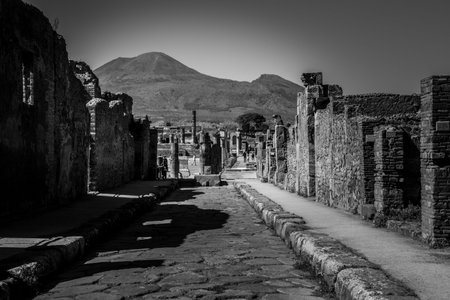 A beautiful typical cobbled street in the ancient city of Pompeii, Southern Italyのeditorial素材