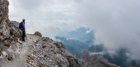 Adventurous hike up to mount Lagazuoi in the Dolomite Alps, autonomous province of South Tirol in Italyの写真素材