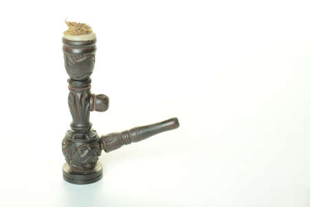 marijuana  on a smoking pipe chillumの写真素材