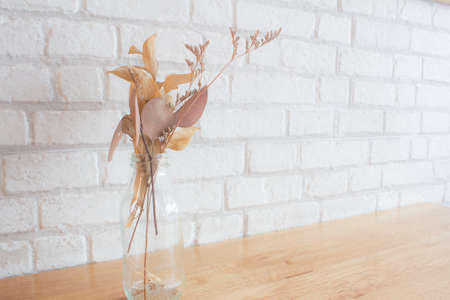 Dry Petals And Leaves In A Bottleの写真素材