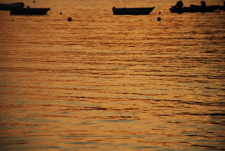 boats in a calm sea in Mallorca Island,Spainの写真素材