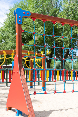 Part of colorful climbing wall made of ropes at playgroundの写真素材