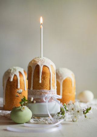 cake and candle, all for a holiday , flowers and eggs for a new life in the spring.