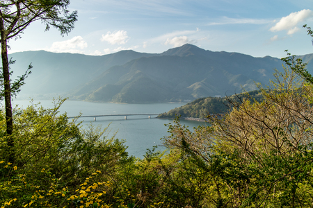 The big bridge (oohashi) that stretches across Lake Kawaguchi in Yamanashi, Japan.の写真素材