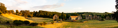 Brompton on Swale, United Kingdom - 07/24/2018: The ruins of Easby Abbey next to the Parish church of Saint Agathaのeditorial素材