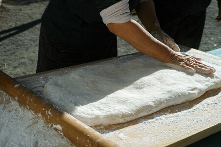 Mochi being pushed flat ready to make into mochi balls for the new yearの写真素材