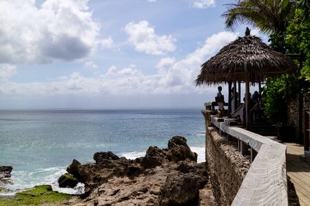 beautiful coastal scenery along the Bali coastline with a viewing platformの写真素材