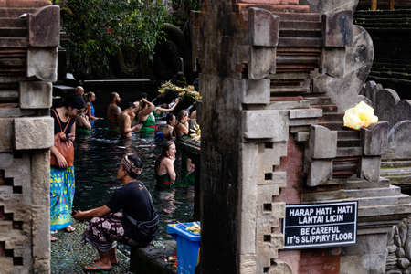 Bali, Indonesia - 29 5 19: People bathing in the holy fountains at Tirta Empul temple in Ubudのeditorial素材