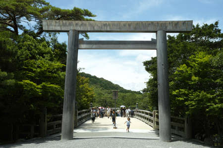Ise, Japan - 28 6 19: People crossing the bridge that is the main entrance to Ise Jingu Shrineのeditorial素材