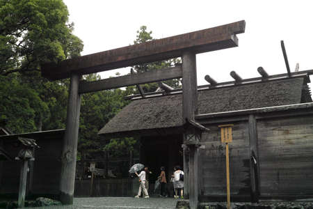 Ise, Japan - 27 6 19: People praying at a smaller shrine located on the Ise Jingu groundsのeditorial素材