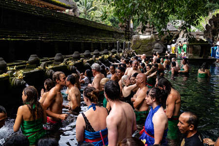 Bali, Indonesia - 29 5 19: People bathing in the holy fountains at Tirta Empul temple in Ubudのeditorial素材