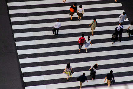 Tokyo, Japan - 9, 8, 19: People crossing a zebra crossing, seen from aboveのeditorial素材
