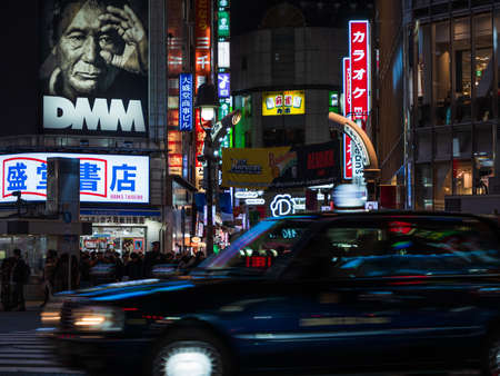 Shibuya, Japan - 7.2.20: Traffic passing through Shibuyas famous scramble crossingのeditorial素材