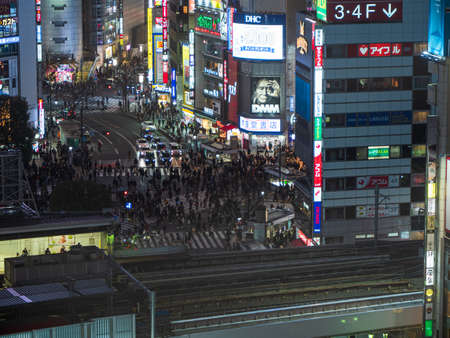 Shibuya, Japan - 7.2.20: Shibuya crossing from a high vantage point at nightのeditorial素材