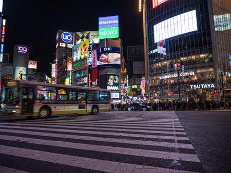 Shibuya, Japan - 7.2.20: Traffic passing through Shibuyas famous scramble crossingのeditorial素材