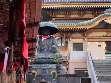 Tokyo, Japan - 18.11.19: The large Buddha statue sat in Sugamo shrineのeditorial素材