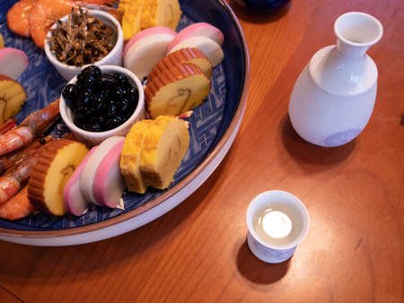The table being set for a traditional new years dinner in Japanの写真素材