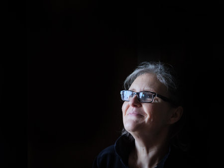 A beautiful middle aged lady posing for the cameraの写真素材