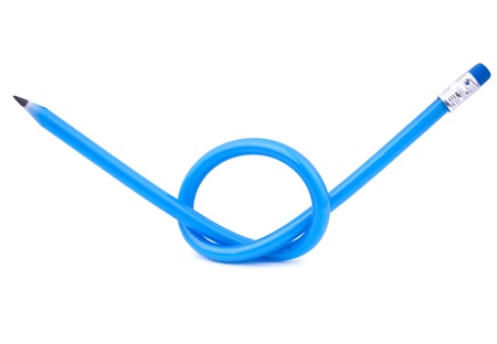 A blue flexible pencil tied in a knot over white backgroundの写真素材