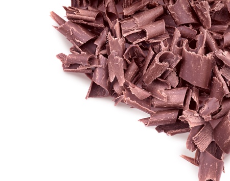  Curly pieces of milk chocolate on a white backgroundの写真素材