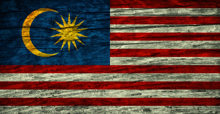 Vintage flag of Malaysia on wooden surfaceの写真素材